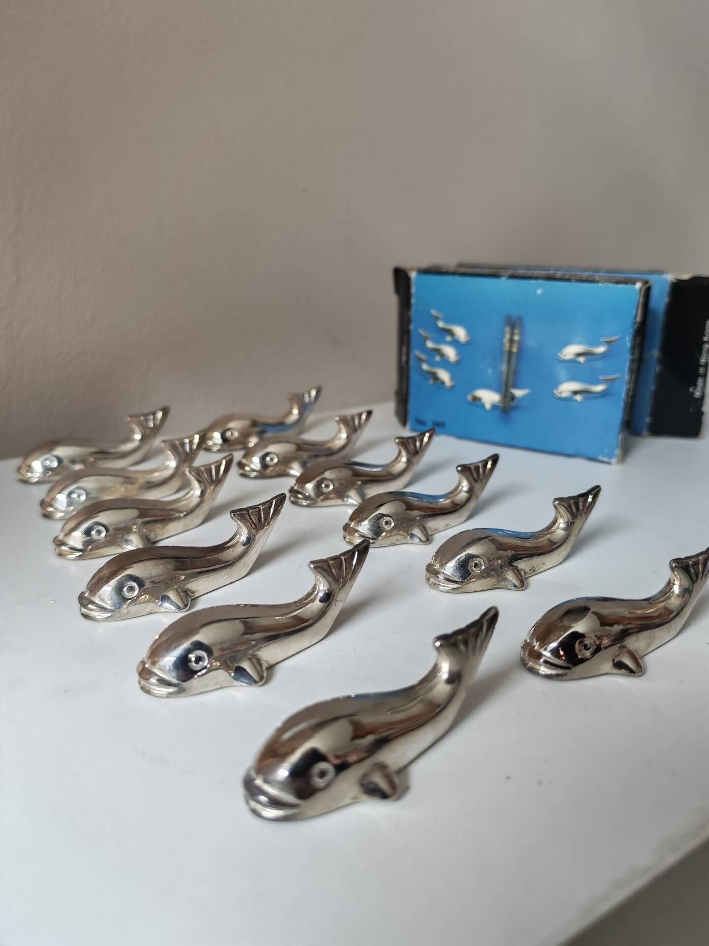 12 silver metal whale knife rests