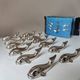 12 silver metal whale knife rests