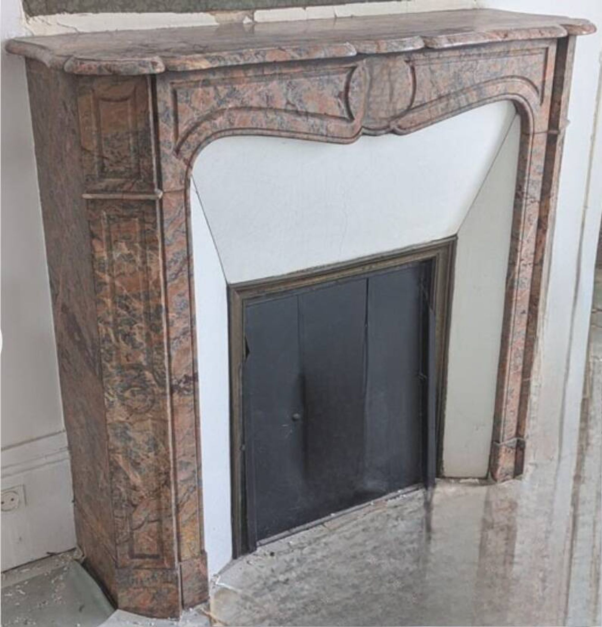 Pompadour fireplace in pink marble