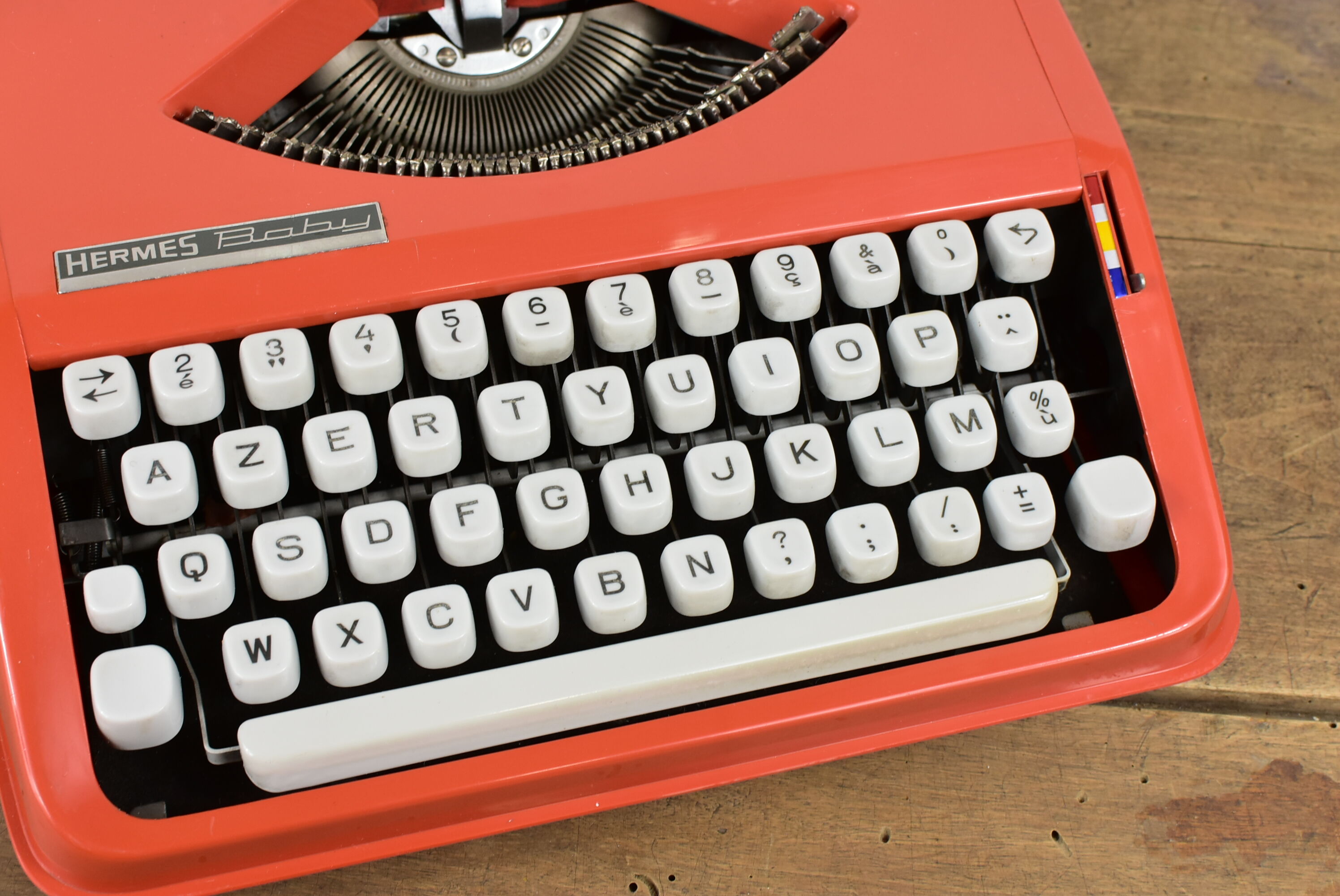 Hermès Baby orange typewriter.