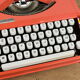 Hermès Baby orange typewriter.