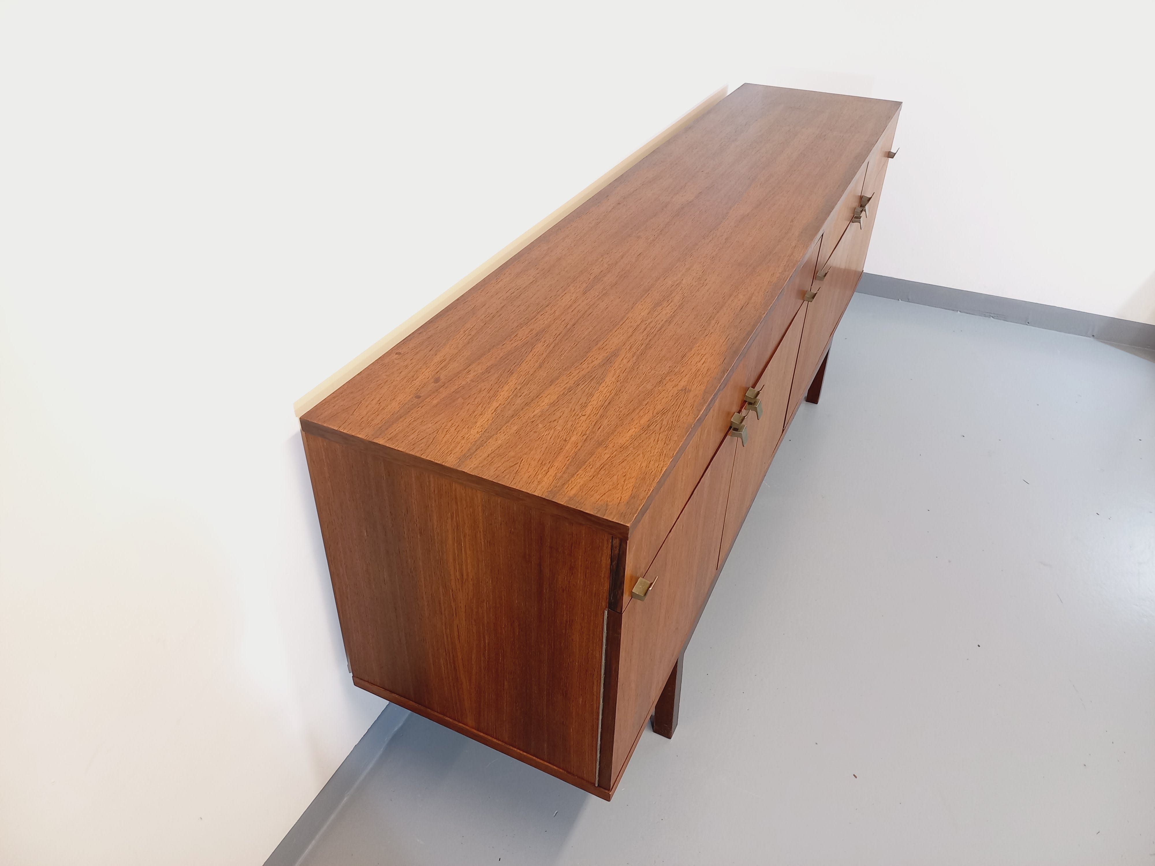 Vintage Scandinavian style row in rosewood and brass from the 60s