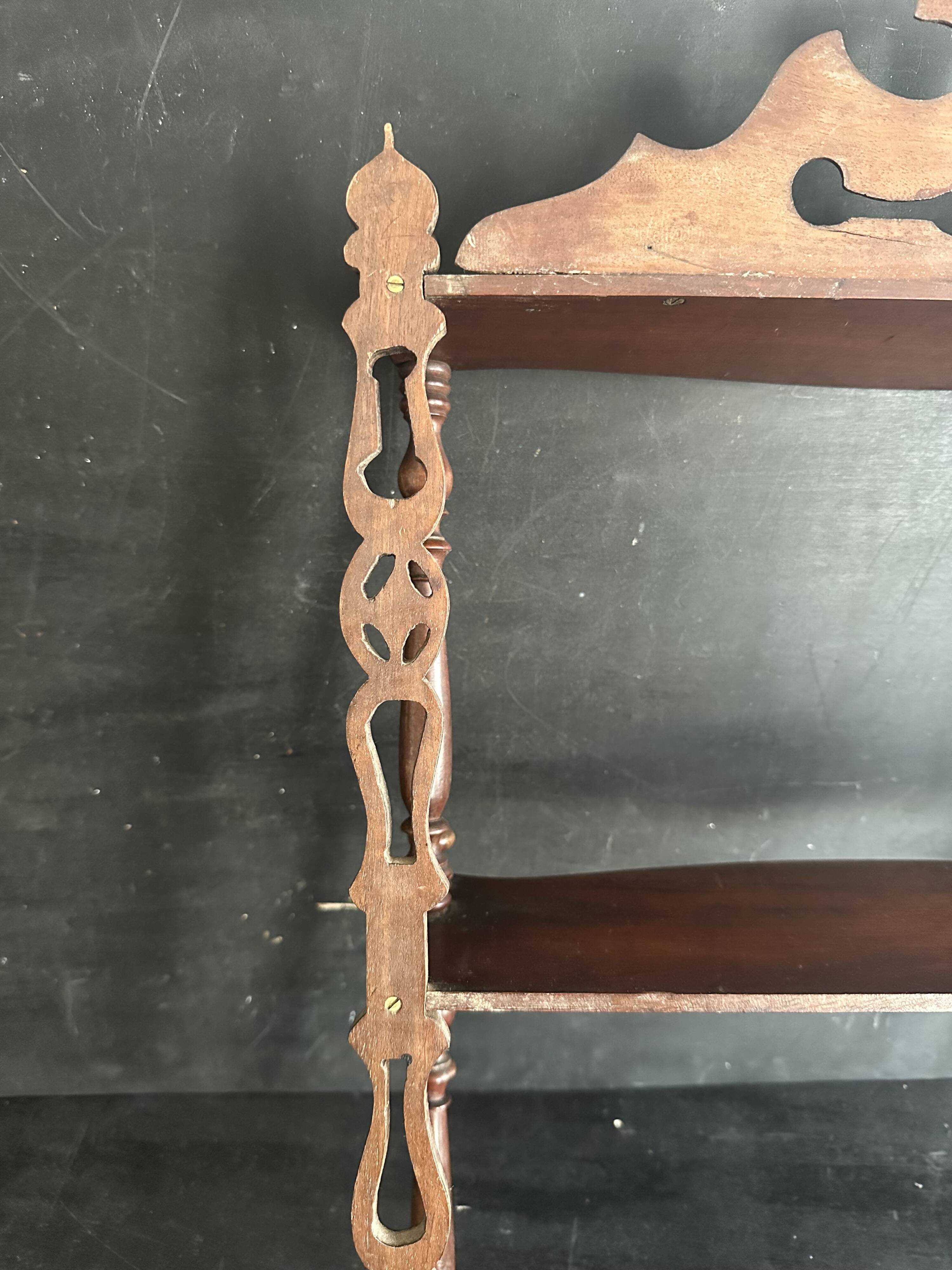 Napoleon III wall shelf in turned wood with a pediment.