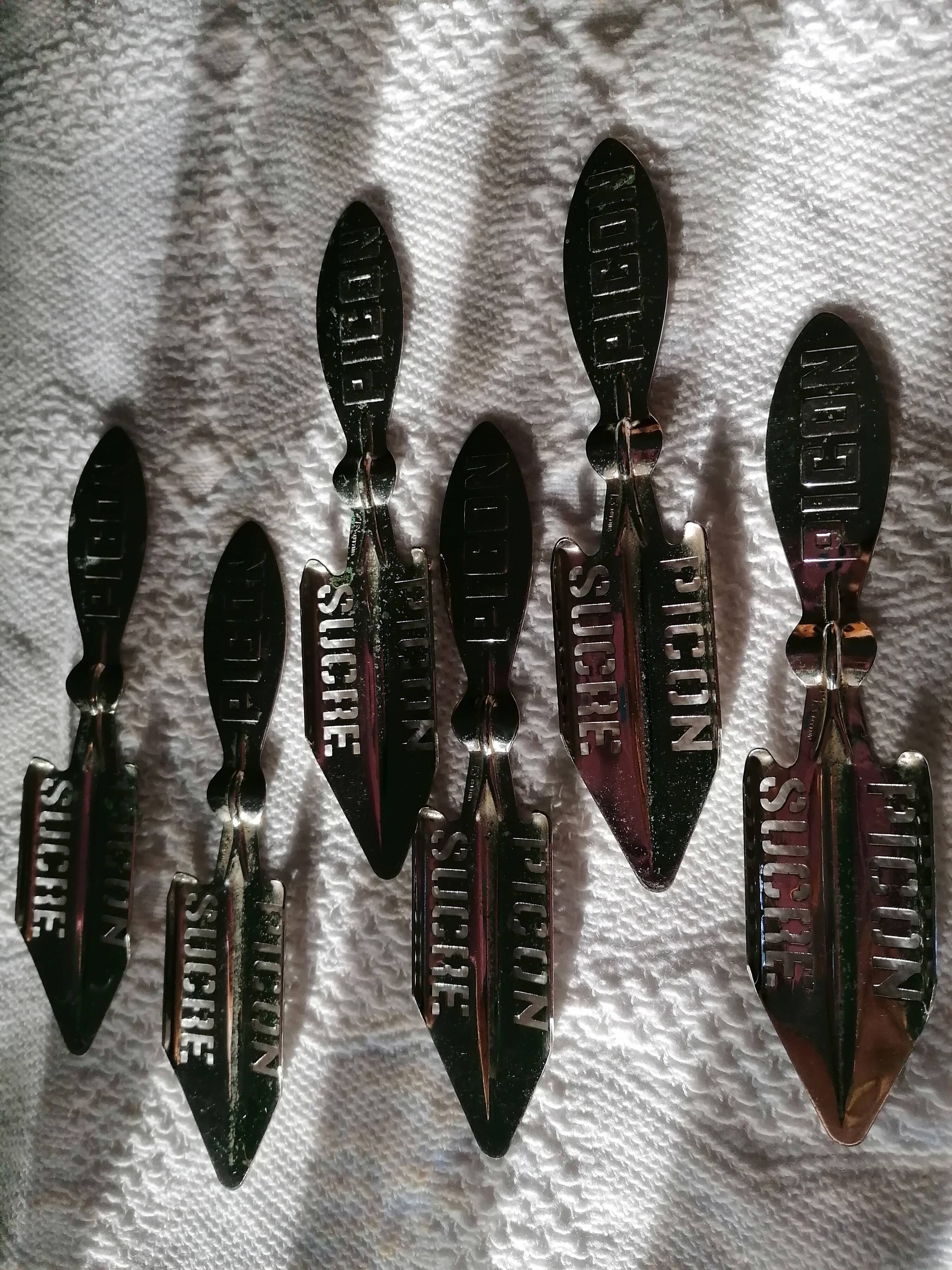 Absinthe service glasses and spoons.