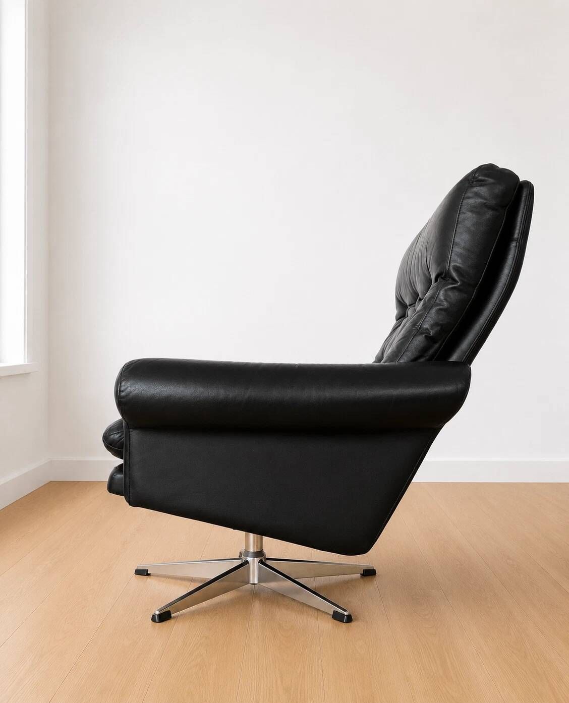 Vintage Danish mid-century black leather swivel chair 1970s