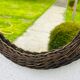 Vintage sun mirror in woven wicker