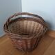 Woven wicker basket with handle