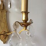 Paire d’appliques anciennes style Louis XVI en bronze doré et cristal