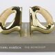 Pair of Carl Auböck Flat Iron bookends in brass and rattan #3530, Vienna, Austria