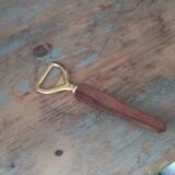 Vintage decapsulator in wood and gilded steel