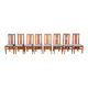 Set of 8 teak lounge chairs with high backs and zebra-striped seats