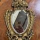 Miroir au putto style Louis XV Rocaille en bronze doré