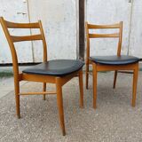 Pair of Scandinavian chairs in teak and black skaï, 60s
