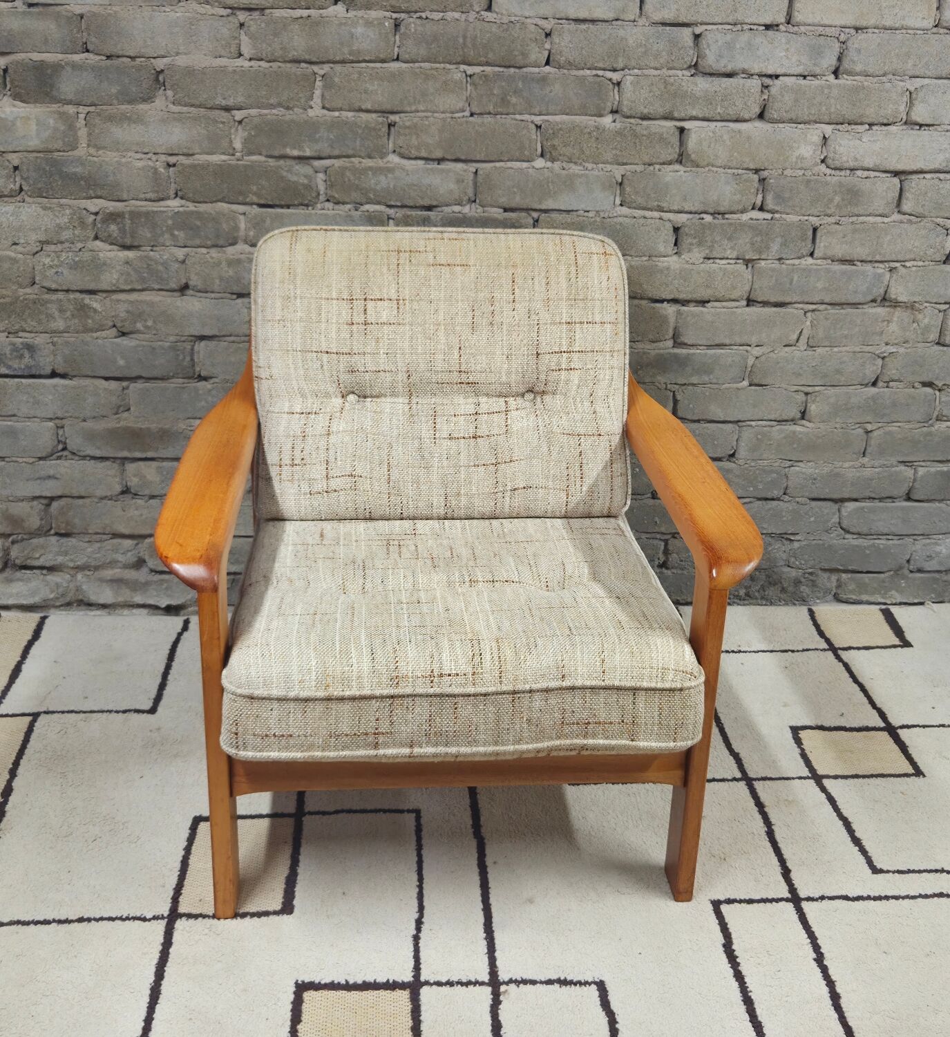 Danish canapé and its 1970s teak armchair