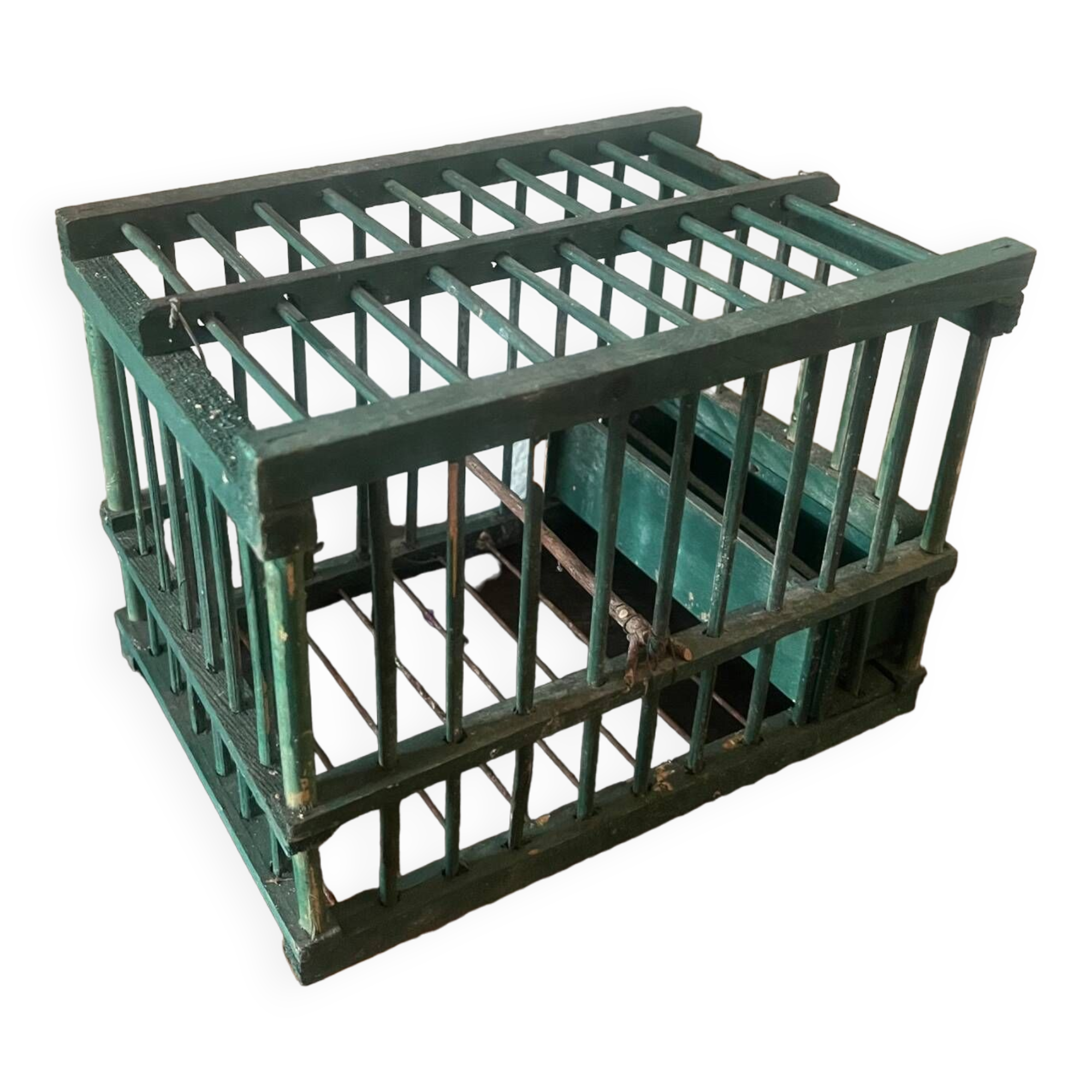 old bird cage made of wood and painted green