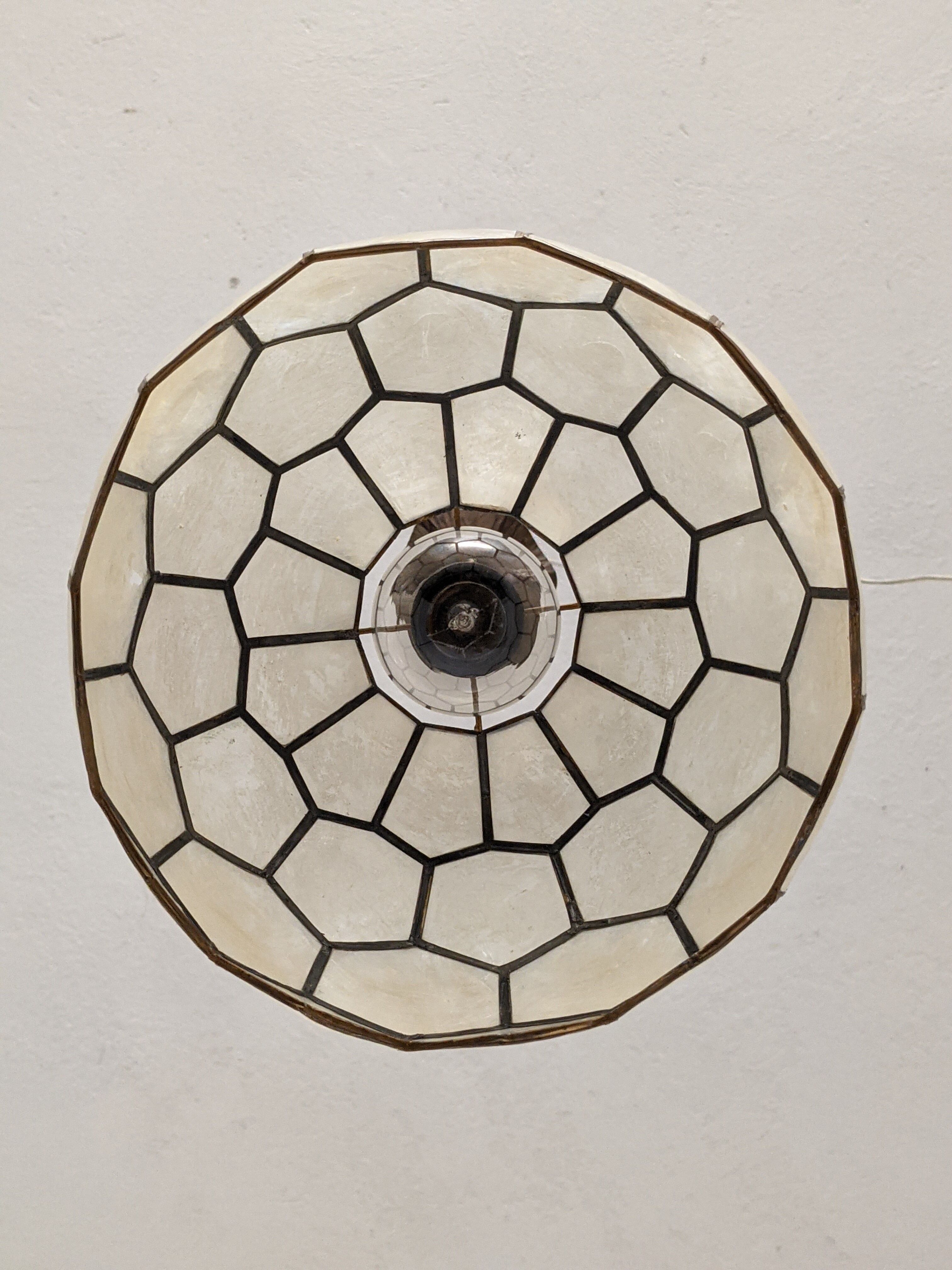 Mother-of-pearl suspension of the 70s