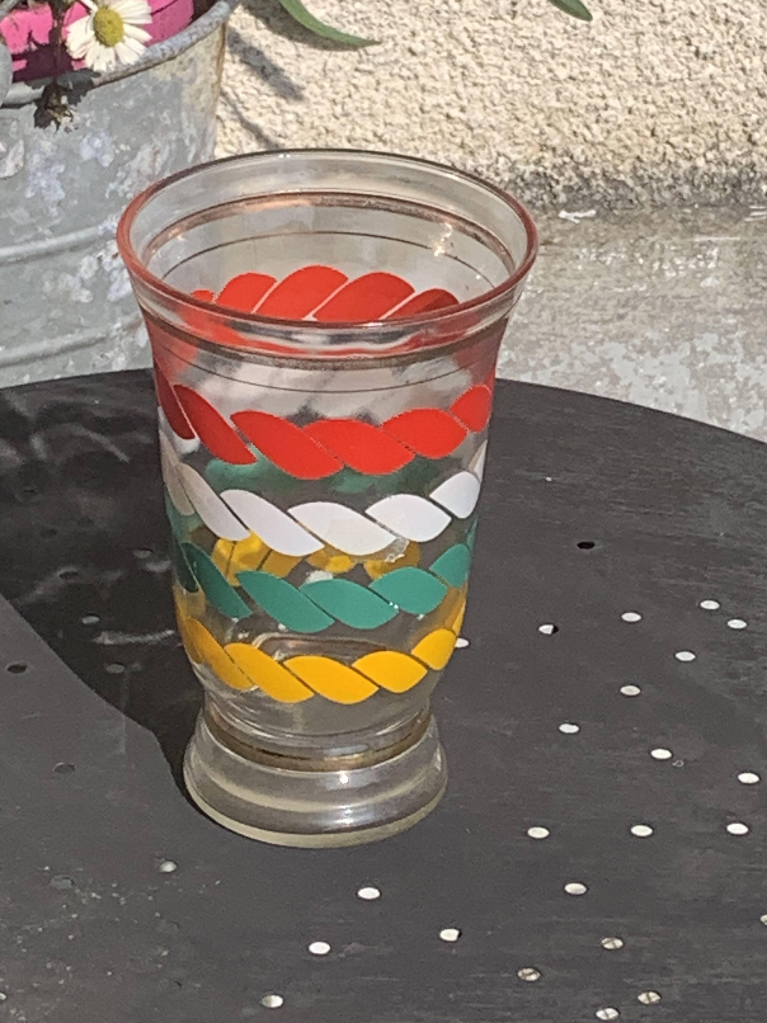 Transparent and gold glass vase and red, white, green and yellow silkscreen lines vintage 1960