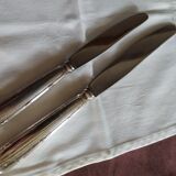 Stainless steel knives and silver metal