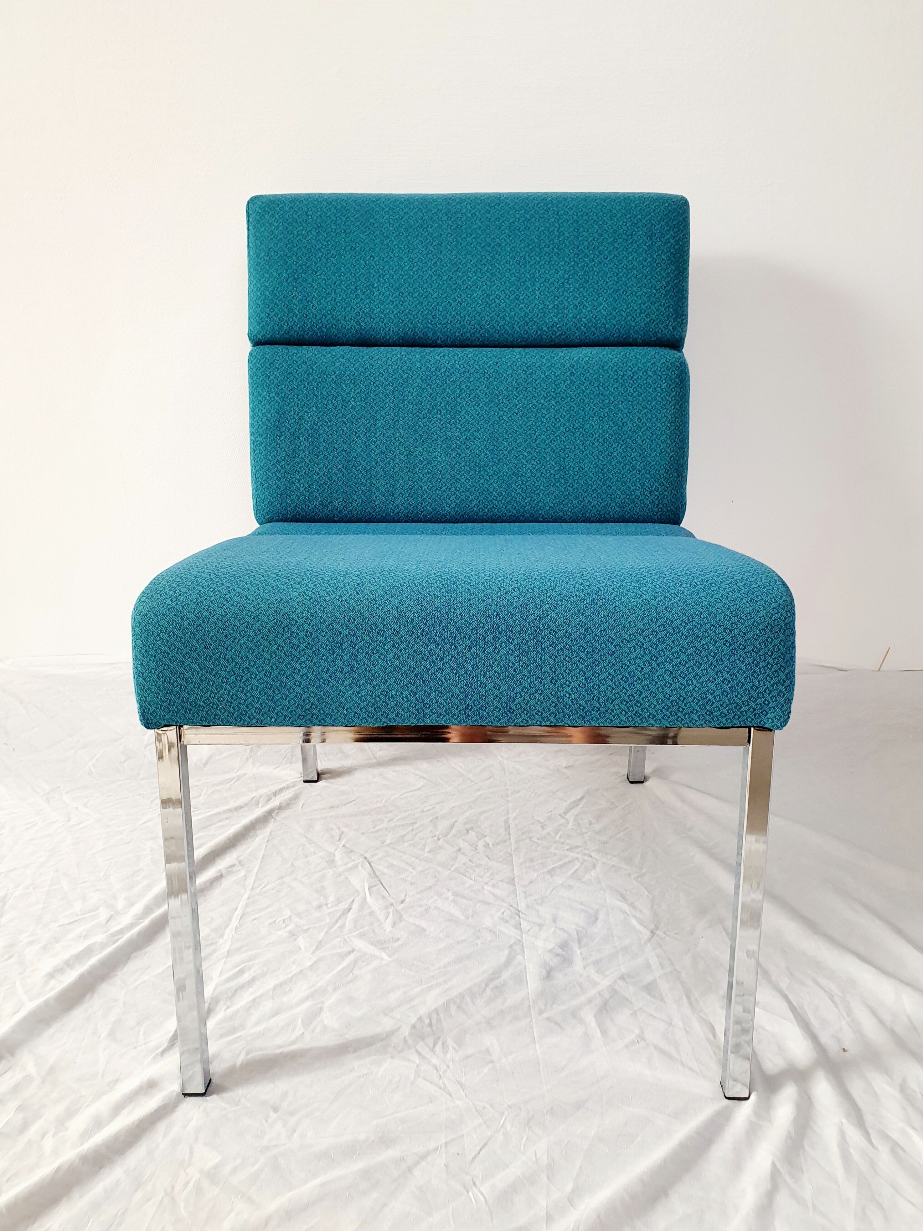 Vintage metal and fabric armchair
