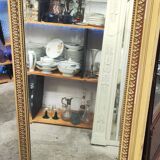 Old large Louis XVI style trumeau mirror with pediment and floral basket knot