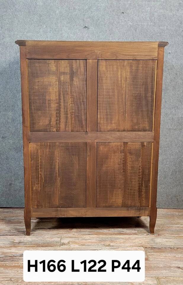 Bibliothéque galbée style Louis XV en bois de rose et marquéterie 1950
