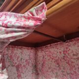 Old wardrobe in old wood and vintage fabric