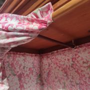 Old wardrobe in old wood and vintage fabric