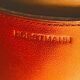 Orangeade service stamped Horstmann in stitched cognac leather.
