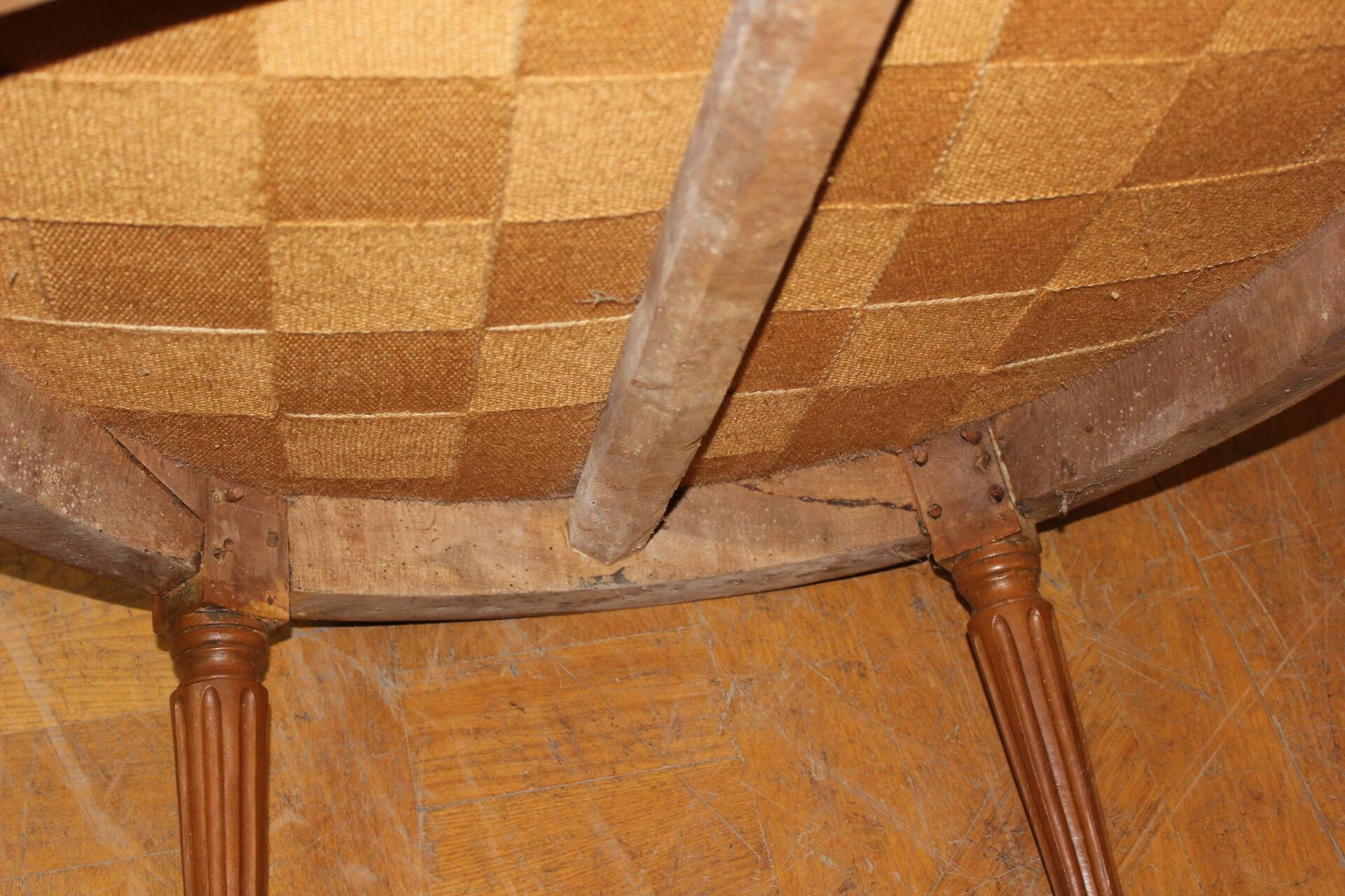 Pair of Louis XVI Bergères in walnut, late 18th century.