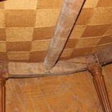 Pair of Louis XVI Bergères in walnut, late 18th century.