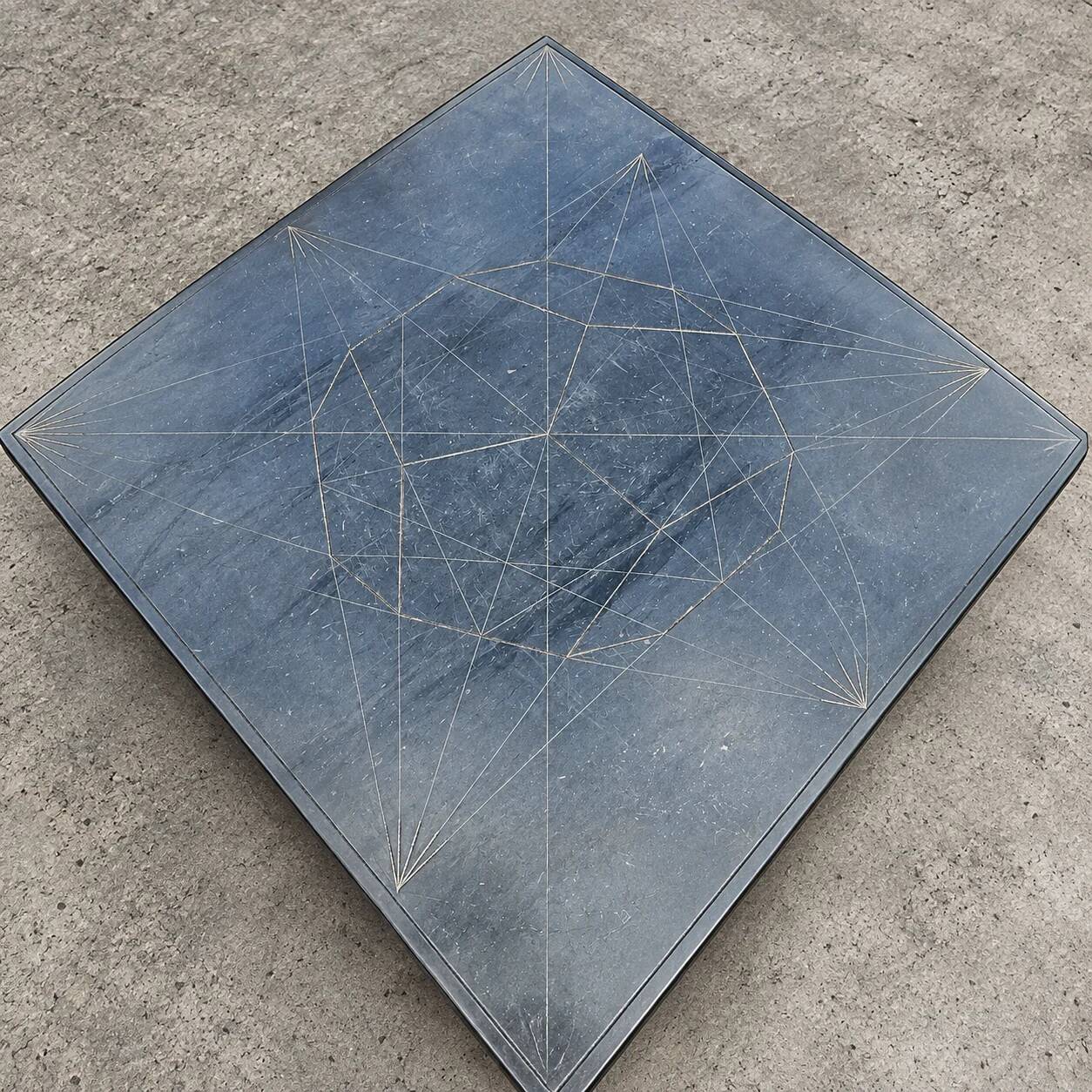 Weighty coffee table with solid iron frame and stone slate table tops, made on commission by architect Alex Vervoordt, Belgium 1990s