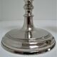 three brass and chrome candle holders early twentieth century