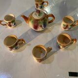 Vintage earthenware teapot and cup set