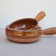 Flat glazed earthenware fondue pot