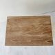Balinese bedside table in solid carved and limed wood