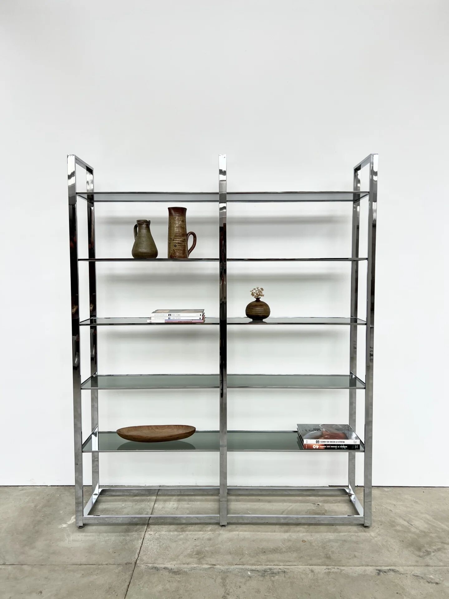 Chrome bookshelf with smoked glass — Italy, 1970s