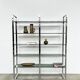 Chrome bookshelf with smoked glass — Italy, 1970s
