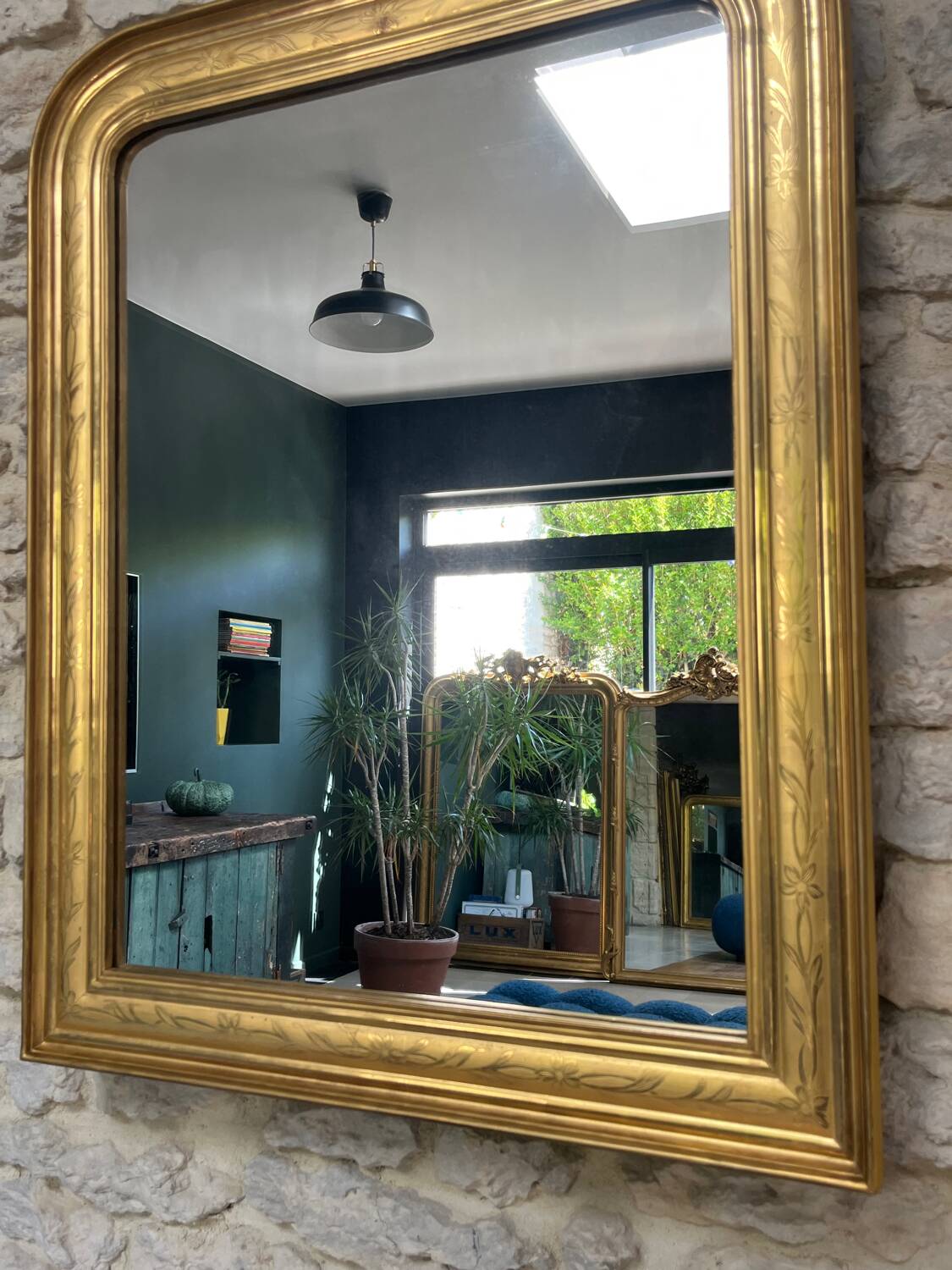 Antique mirror 86.5/69cm Louis-Philippe gilded with gold leaf, engraved decoration.