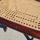Set of 2 folding chairs in wood and cane.