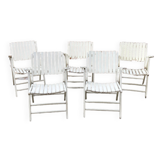 Five wooden garden armchairs