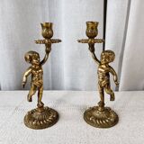 Pair of bronze “Cherubim” candlesticks