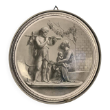 Glazed earthenware tondo in the antique style.