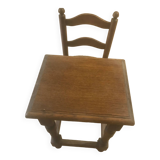 Small children's table (or coffee table) in brown varnished oak.