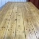 Early 20th-century farmhouse table made of fir, elm, and chestnut.