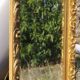 Wooden mirror decorated with gold from the 1920s