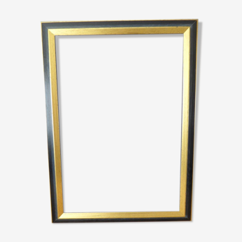 Wooden frame of black and gold color 63x46 cm