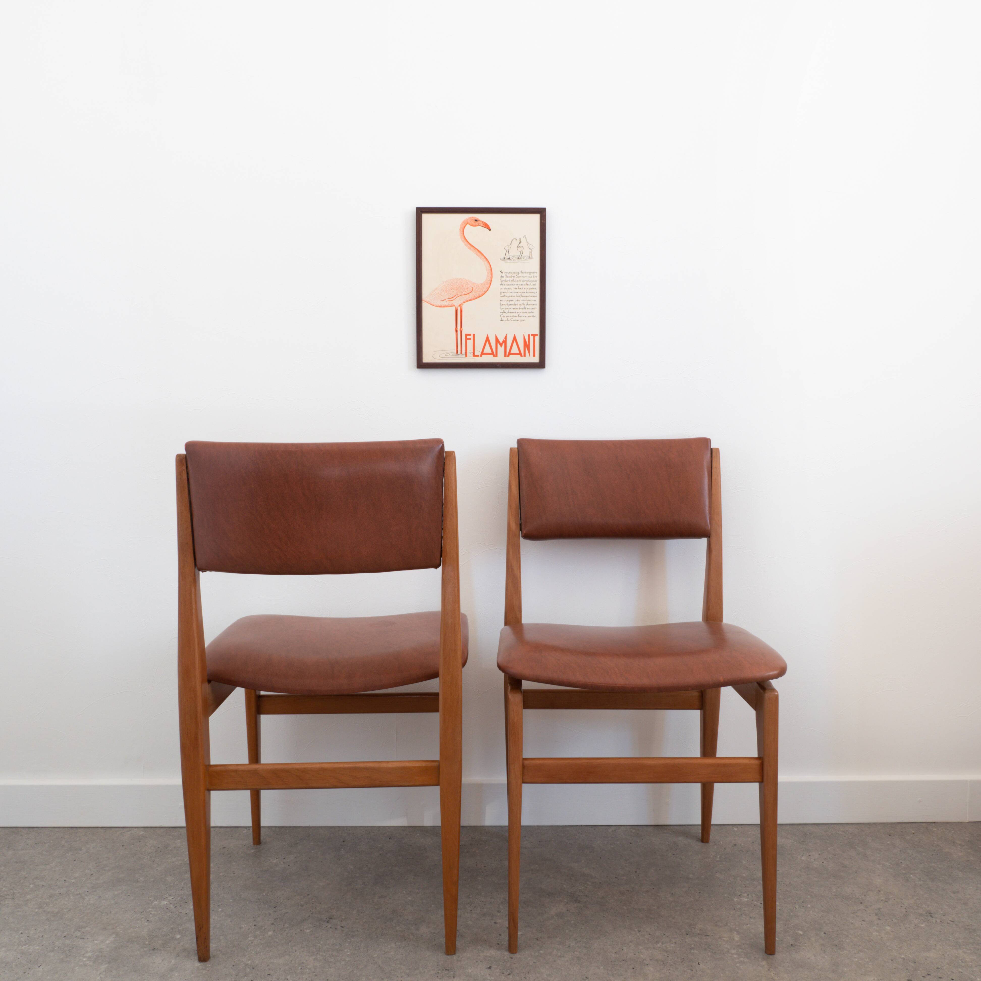 Pair of chairs in wood and brown skaï