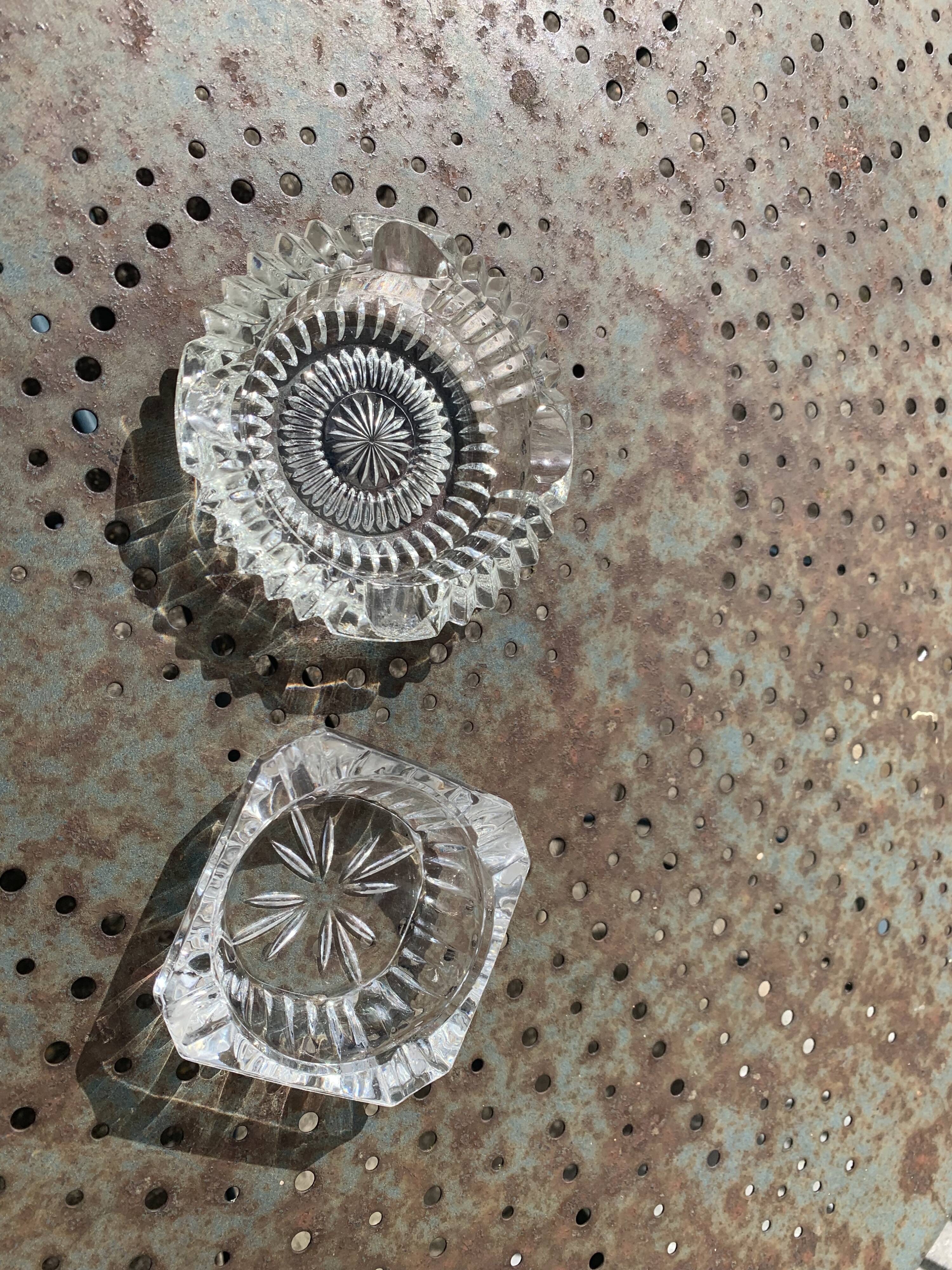 Set of two elegant vintage transparent glass and crystal ashtrays