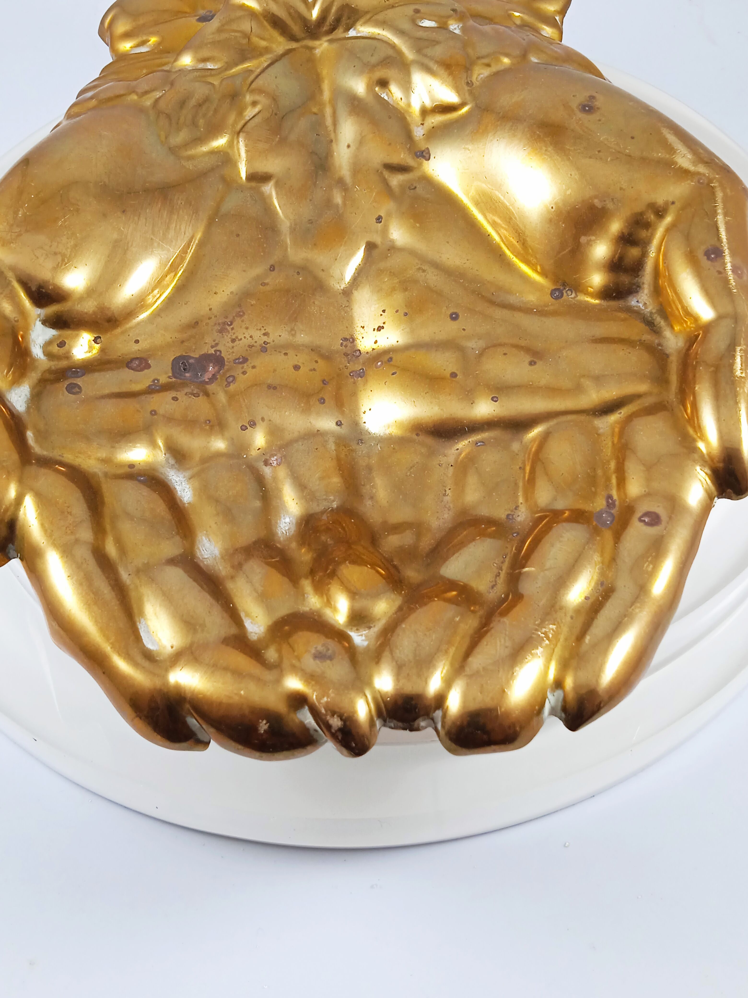 Antique hand-shaped brass soap holder
