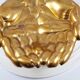 Antique hand-shaped brass soap holder